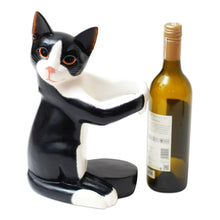 Load image into Gallery viewer, Hand Carved Black and White Cat Figurine Wine Holder - Kitty Clasp | NOVICA