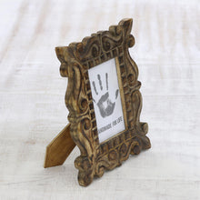 Load image into Gallery viewer, Hand-Carved Natural Mango Wood Ornate Photo Frame 4x6 - Mughal Majesty | NOVICA