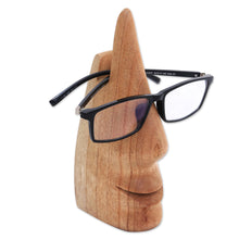 Load image into Gallery viewer, Whimsical Brown Hand Carved Wood Face Eyeglasses Holder - Nosing Around | NOVICA