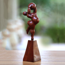 Load image into Gallery viewer, Suar Wood Sculpture of a Woman with a Ball from Bali - Ball Stretch | NOVICA