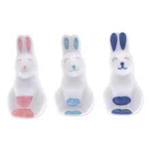 Load image into Gallery viewer, Set of 3 Ceramic Figurines of Pink and Blue Bunnies - Sweet Reunion | NOVICA