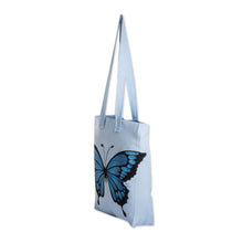 Load image into Gallery viewer, Hand-Painted Butterfly-Themed Polyester Tote Bag in Blue - Winter Wings | NOVICA