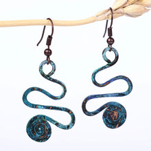 Load image into Gallery viewer, Spiral-Themed Copper Dangle Earrings with Oxidized Finish - Whirlwind Splendor | NOVICA