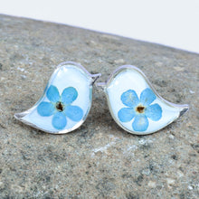 Load image into Gallery viewer, Bird-Shaped Natural Blue Flower Resin Button Earrings - Symphony of Memories | NOVICA