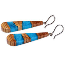Load image into Gallery viewer, Drop-Shaped Apricot Wood Blue Resin Dangle Earrings - Oceanic Dimension | NOVICA