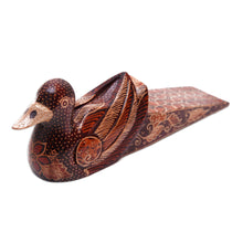Load image into Gallery viewer, Handmade Batik Duck-Shaped Pule Wood Door Stop in Warm Hues - Duck Dimension | NOVICA