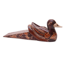 Load image into Gallery viewer, Handmade Batik Duck-Shaped Pule Wood Door Stop in Warm Hues - Duck Dimension | NOVICA