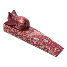 Load image into Gallery viewer, Handmade Batik Cat-Shaped Pule Wood Door Stop in Warm Hues - Feline Space | NOVICA