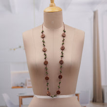 Load image into Gallery viewer, Handmade Brown and Green Haldu Wood Beaded Station Necklace - Harmony in Forest | NOVICA