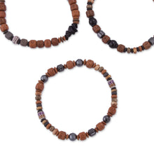 Load image into Gallery viewer, Onyx and Hematite Ceramic Beaded Stretch Bracelet from Peru - Andean Spirit | NOVICA
