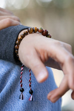 Load image into Gallery viewer, Yoga Tridatu Men's Onyx Tiger's Eye Unakite Pendant Bracelet - Tridatu Protection | NOVICA