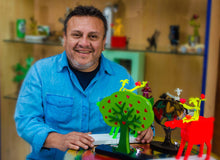 Load image into Gallery viewer, Harlequin Loves Reading Green Aluminum Handcrafted Sculpture - Good Read | NOVICA