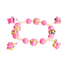 Load image into Gallery viewer, Handcrafted Ceramic Beaded Stretch Bracelet in Pink - Little Pink Pigs | NOVICA