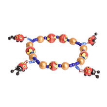 Load image into Gallery viewer, Handcrafted Ceramic Beaded Stretch Bracelet with Ladybugs - Cheerful Ladybugs | NOVICA