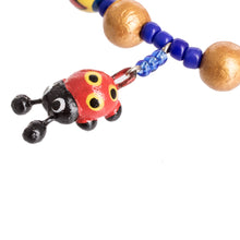 Load image into Gallery viewer, Handcrafted Ceramic Beaded Stretch Bracelet with Ladybugs - Cheerful Ladybugs | NOVICA