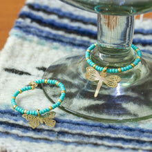 Load image into Gallery viewer, Set of 2 Handmade Beaded Drink Markers with Golden Pendants - Turquoise Flutter | NOVICA
