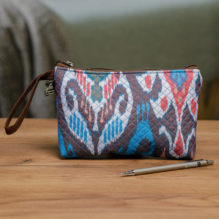 Traditional Ikat Patterned Cosmetic Bag with Zipper Closure - Elegant Ideas | NOVICA