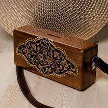 Load image into Gallery viewer, Hand-Carved Floral Walnut Wood Sling with Leather Straps - Sylvan Empress | NOVICA