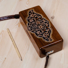 Load image into Gallery viewer, Hand-Carved Floral Walnut Wood Sling with Leather Straps - Sylvan Empress | NOVICA