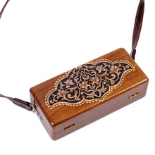 Load image into Gallery viewer, Hand-Carved Floral Walnut Wood Sling with Leather Straps - Sylvan Empress | NOVICA

