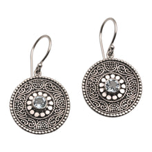 Load image into Gallery viewer, Blue Topaz and 925 Silver Circular Dangle Earrings from Bali - Mystic Shields | NOVICA