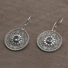 Load image into Gallery viewer, Blue Topaz and 925 Silver Circular Dangle Earrings from Bali - Mystic Shields | NOVICA