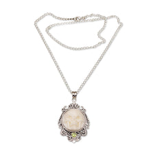 Load image into Gallery viewer, Peridot and Bone White Skull Pendant Necklace from Bali - Skull Stare in White | NOVICA