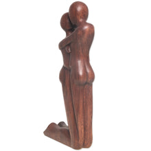 Load image into Gallery viewer, Hand Carved Romantic Suar Wood Statuette from Bali - Kneeling Embrace | NOVICA
