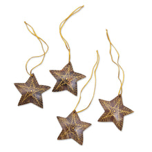 Load image into Gallery viewer, Set of 4 Handmade Brown Coconut Shell Star Ornaments - Bright Lights in the Sky | NOVICA