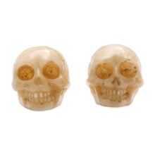 Load image into Gallery viewer, Hand-Carved Skull Bone Stud Earrings from Bali - Faces of Trunyan | NOVICA