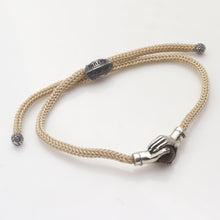 Load image into Gallery viewer, Bali Tiger's Eye & Sterling Silver Beige Cord Unity Bracelet - Silver Beige Handshake | NOVICA