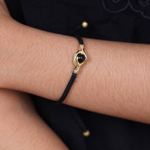 Load image into Gallery viewer, Brass and Black Obsidian Cord Unity Bracelet from Bali - Golden Handshake | NOVICA
