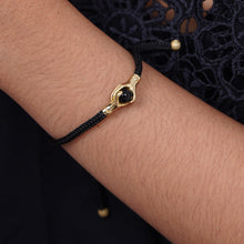 Load image into Gallery viewer, Brass and Black Obsidian Cord Unity Bracelet from Bali - Golden Handshake | NOVICA
