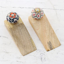 Load image into Gallery viewer, Pair of Wood Ceramic & Brass Door Stoppers Handmade in India - Heavenly Blossoms