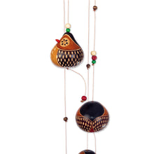Load image into Gallery viewer, Hand-painted and Owl-themed Dried Gourd Mobile from Peru - Magical Owls | NOVICA