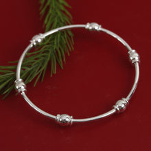 Load image into Gallery viewer, Gleaming Sterling Silver Bangle Bracelet from Mexico - Six Beads | NOVICA
