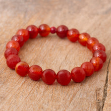 Load image into Gallery viewer, Handmade Red Carnelian Stretch Bracelet from Peru - Peruvian Passion | NOVICA
