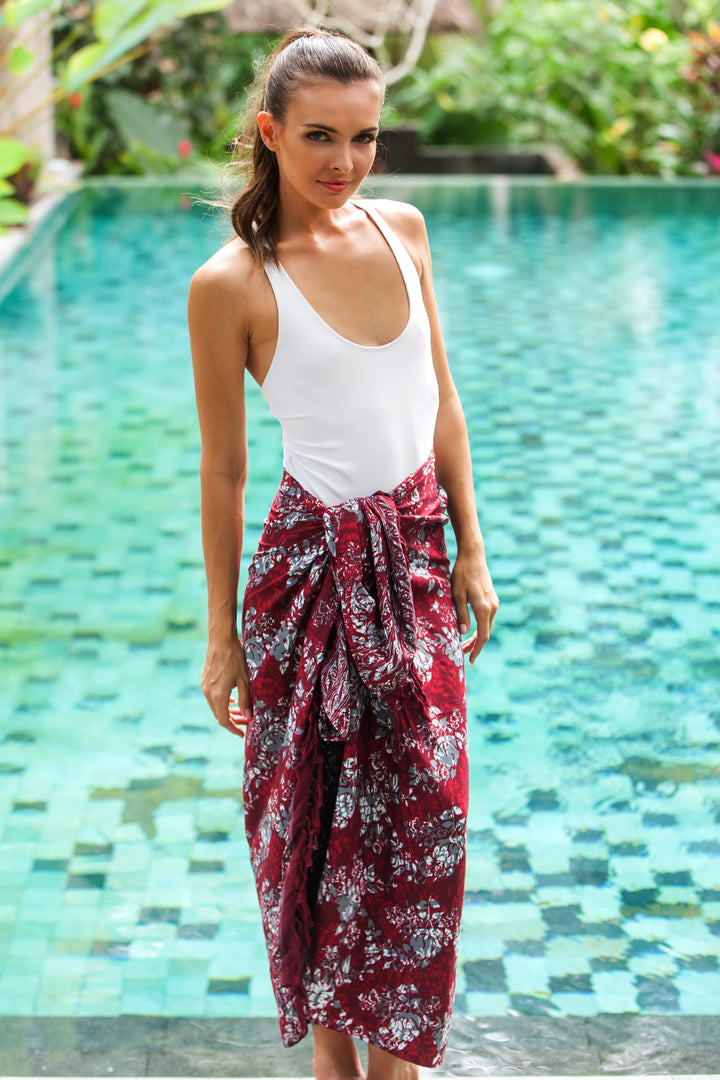 Red Floral Rayon Sarong with Hand Stamped Batik Pattern - Tropical Garden in Claret | NOVICA