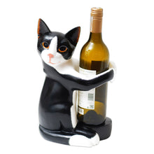 Load image into Gallery viewer, Hand Carved Black and White Cat Figurine Wine Holder - Kitty Clasp | NOVICA
