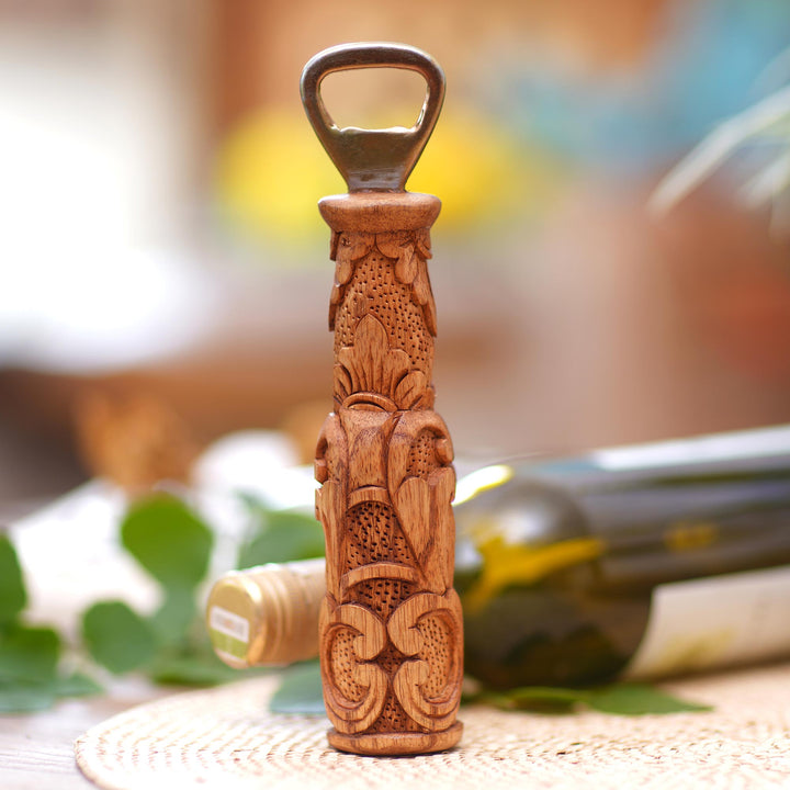 Handcrafted Suar Wood Floral Bottle Opener from Bali - Floral Refreshment | NOVICA