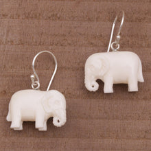 Load image into Gallery viewer, Sleek Cow Bone Carved Elephant Earrings with Silver Hooks - White Elephant | NOVICA
