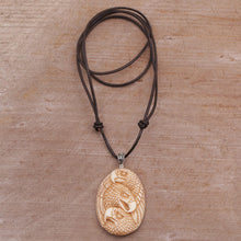 Load image into Gallery viewer, Handcrafted Eagle-Themed Bone Pendant Necklace from Bali - Eagle Trio | NOVICA
