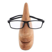 Load image into Gallery viewer, Whimsical Brown Hand Carved Wood Face Eyeglasses Holder - Nosing Around | NOVICA
