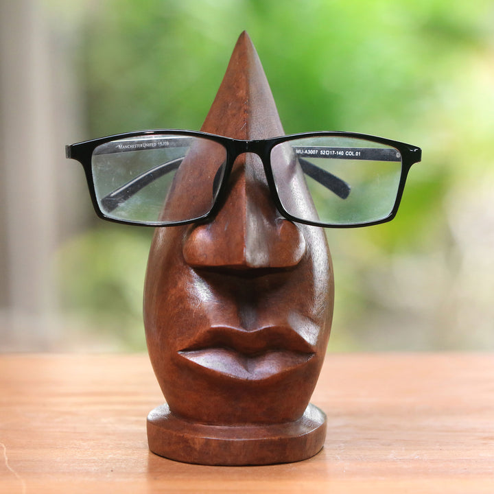 Wood Eyeglasses Stand in Light Brown from Bali - Prominent Nose in Light Brown | NOVICA