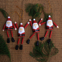 Load image into Gallery viewer, Dangling Wood Santa Ornaments from Bali (Set of 4) - Dancing Santas | NOVICA
