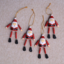 Load image into Gallery viewer, Dangling Wood Santa Ornaments from Bali (Set of 4) - Dancing Santas | NOVICA
