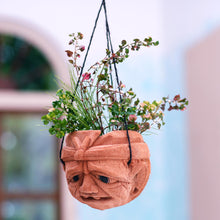 Load image into Gallery viewer, Carved Coconut Shell Hanging Planter - Don't Worry | NOVICA
