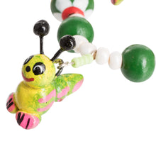 Load image into Gallery viewer, Handcrafted Ceramic Beaded Stretch Bracelet in Green - Merry Caterpillars | NOVICA
