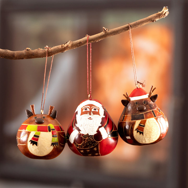Peruvian Hand-painted Set of 3 Dried Gourd Holiday Ornaments - Santa and His Reindeer | NOVICA