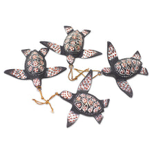 Load image into Gallery viewer, Handcrafted Jempinis Wood Sea Turtle Ornaments (Set of 4) - Serene Shells | NOVICA
